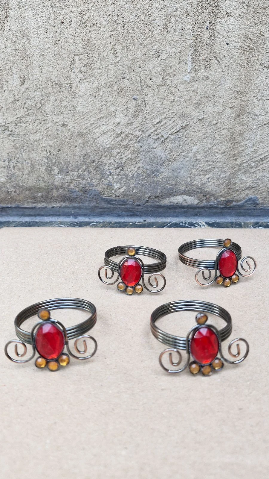 4 Serviette Rings. Red and orange.
