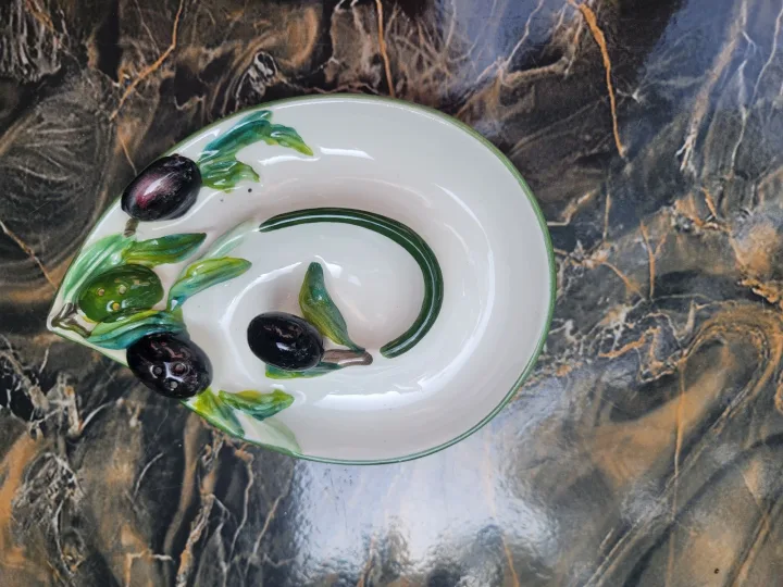 Olive Holder