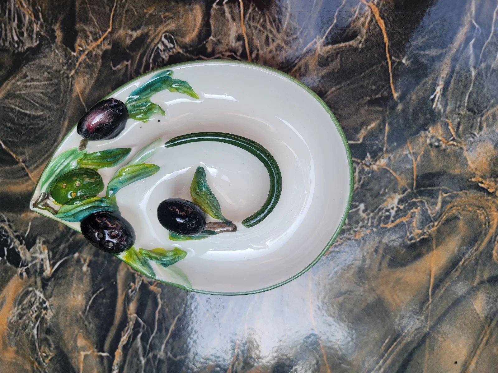 Olive Holder